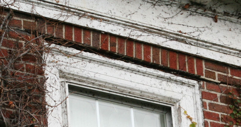 Rusted Lintels heave the walls