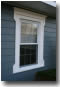 Folk Victorian Trim on a Tract Home Colonial