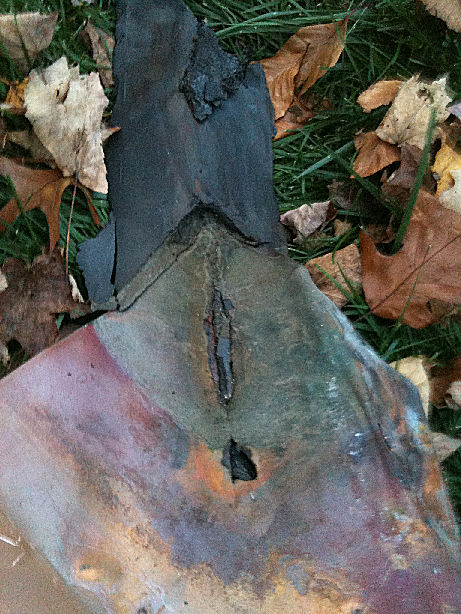Asphalt roof cement destroys copper